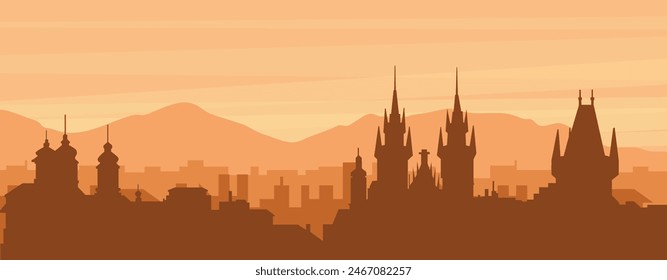 Brown panoramic poster of the city skyline with misty background buildings, sunrise, clouds and mountains of PRAGUE, CZECH REPUBLIC