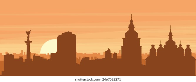 Brown panoramic poster of the city skyline with misty background buildings, sunrise, clouds and mountains of KYIV, UKRAINE