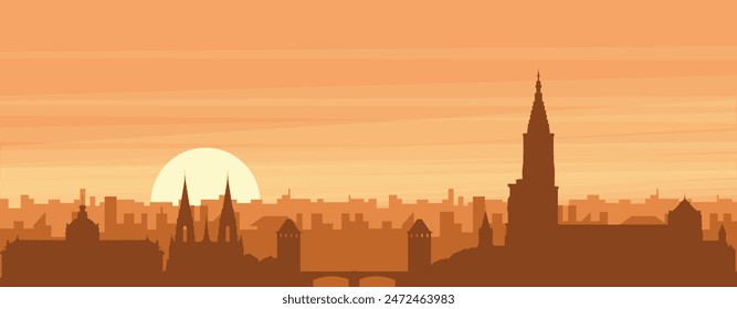 Brown panoramic poster of the city skyline with misty background buildings, sunrise, clouds and mountains of STRASBOURG, FRANCE