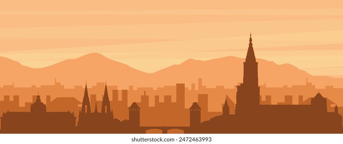 Brown panoramic poster of the city skyline with misty background buildings, sunrise, clouds and mountains of STRASBOURG, FRANCE