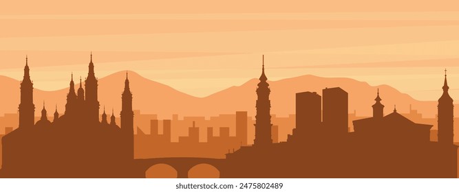 Brown panoramic poster of the city skyline with misty background buildings, sunrise, clouds and mountains of ZARAGOZA, SPAIN