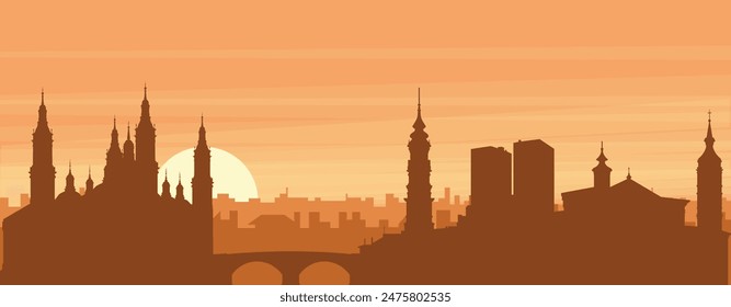 Brown panoramic poster of the city skyline with misty background buildings, sunrise, clouds and mountains of ZARAGOZA, SPAIN