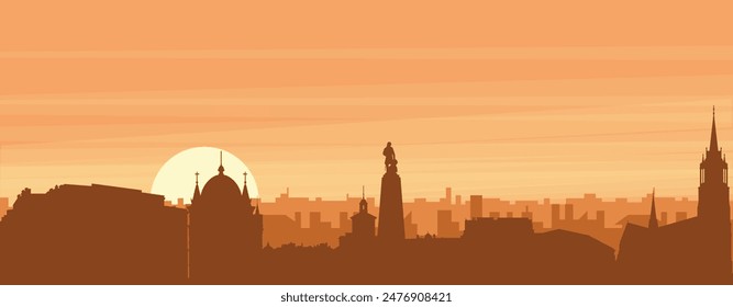 Brown panoramic poster of the city skyline with misty background buildings, sunrise, clouds and mountains of LODZ, POLAND