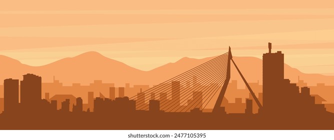 Brown panoramic poster of the city skyline with misty background buildings, sunrise, clouds and mountains of ROTTERDAM, NETHERLANDS