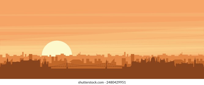 Brown panoramic poster of the city skyline with misty background buildings, sunrise, clouds and mountains of BUDAPEST, HUNGARY