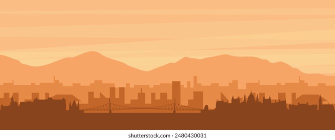 Brown panoramic poster of the city skyline with misty background buildings, sunrise, clouds and mountains of BUDAPEST, HUNGARY