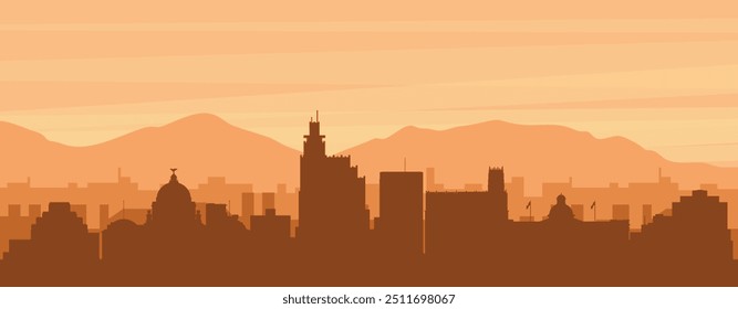 Brown panoramic poster of the city skyline with misty background buildings, sunrise, clouds and mountains of JACKSON, UNITED STATES