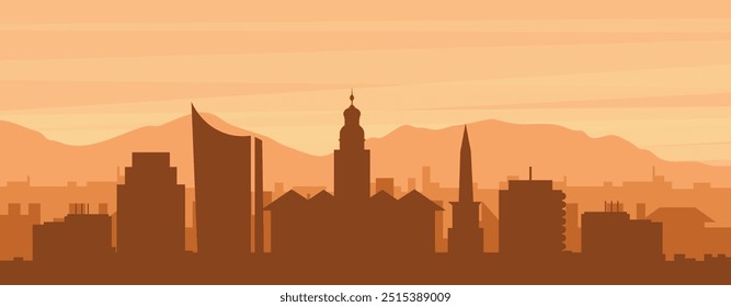 Brown panoramic poster of the city skyline with misty background buildings, sunrise, clouds and mountains of LEIPZIG, GERMANY