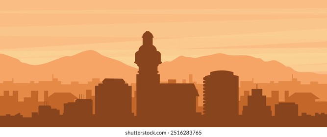 Brown panoramic poster of the city skyline with misty background buildings, sunrise, clouds and mountains of MONTEVIDEO, URUGUAY