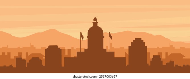 Brown panoramic poster of the city skyline with misty background buildings, sunrise, clouds and mountains of REGINA, CANADA