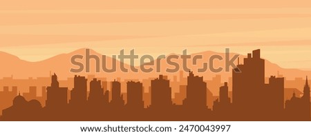 Brown panoramic poster of the city skyline with misty background buildings, sunrise, clouds and mountains of MANAUS, BRAZIL