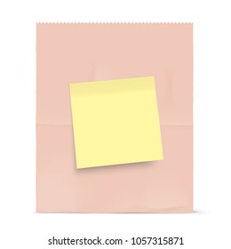 Brown paper bag isolated on background. Grocery kraft bag with yellow sticky note. Bag template.
