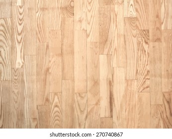 Brown parqueted floor, wooden texture with vertical planks.