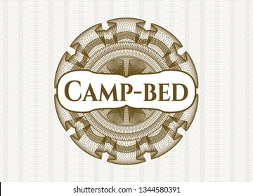 Brown passport money rosette with text Camp-bed inside