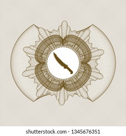 Brown passport money style rosette with combat knife icon inside