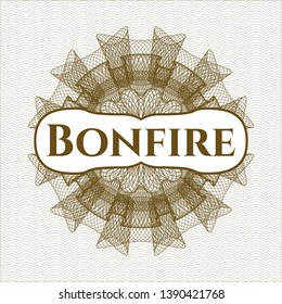 Brown passport rosette with text Bonfire inside