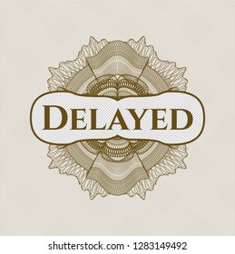 Brown passport rosette with text Delayed inside