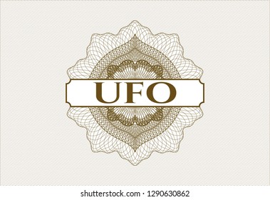 Brown passport rosette with text UFO inside