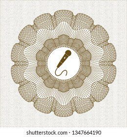 Brown passport style rosette with microphone icon inside