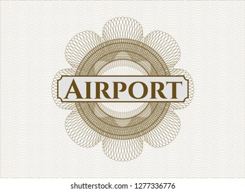 Brown passport style rosette with text Airport inside