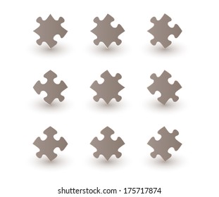 brown puzzle pieces with shadow on white background