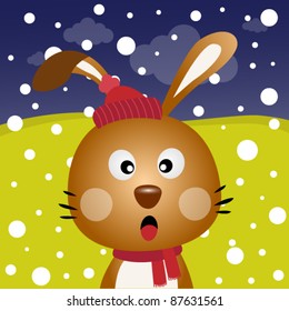 Brown rabbit with snow in the forest