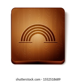 Brown Rainbow with clouds icon isolated on white background. Wooden square button. Vector Illustration
