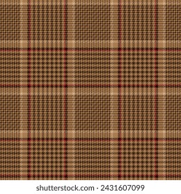 Brown and red checkered plaid. Houndstooth fabric swatch close-up pattern.