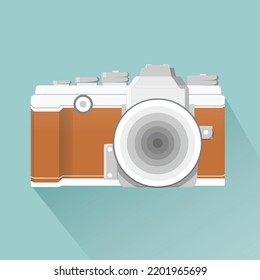 Diseño vectorial de cámara antigua retro o vintage marrón con fondo azul 