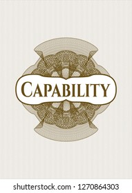 Brown rosette (money style emblem) with text Capability inside