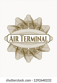 Brown rosette or money style emblem with text Air Terminal inside
