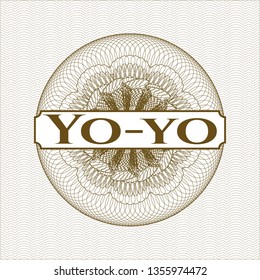 Brown rosette or money style emblem with text Yo-yo inside