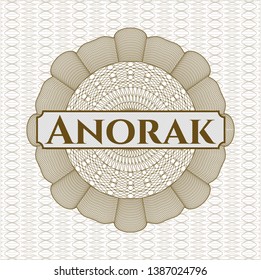 Brown rosette or money style emblem with text Anorak inside