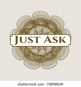 Brown rosette (money style emblem) with text Just Ask inside