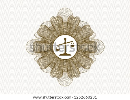Brown rosette or money style emblem with scale icon inside