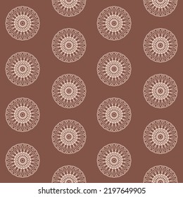 Brown seamless pattern with round wheel ornament for clothing design