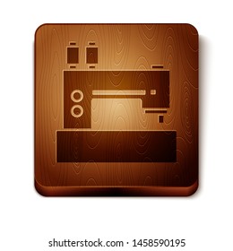 Brown Sewing machine icon isolated on white background. Wooden square button. Vector Illustration
