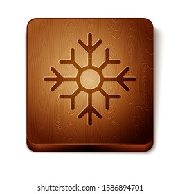 Brown Snowflake icon isolated on white background. Merry Christmas and Happy New Year. Wooden square button. Vector Illustration