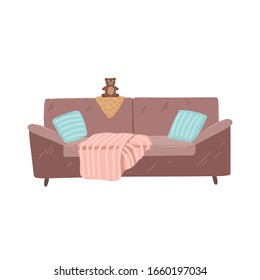 Brown sofa with pillows, blanket and teddy bear. Couch isolated on white background. Vector cartoon illustration