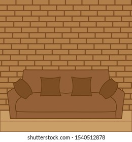 Brown sofa with pillows on a brick wall background