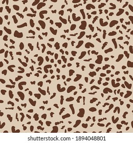 manchas marrones sobre fondo beige. Patrón vectorial sin costura. Patrón repetitivo.