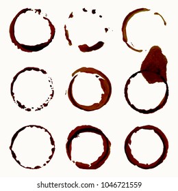 Brown spots. Set of vector illustrations. Spilled coffee or tea imitation. Blurred rounded shape isolated on white background. Grunge dirty circles.