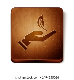 Brown Sprout in hand of environmental protection icon isolated on white background. Seed and seedling. Planting sapling. Ecology concept. Wooden square button. Vector Illustration