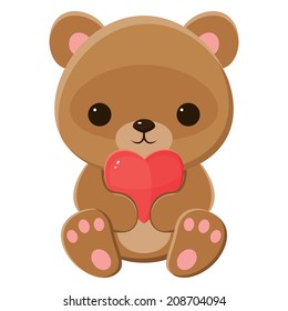 Brown teddy bear holding a heart. Isolated over white