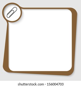 brown text box with paper clip