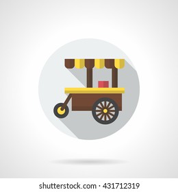 Brown three-wheeled cart with yellow awning. Cafe on wheels. Selling hot drinks, outdoor breakfast, street food trade. Round flat color style vector icon. 