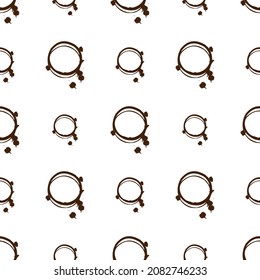 Brown traces of coffee on a white background, seamless pattern, texture for design, vector illustration