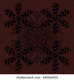 Brown tree with dim trim. Furniture in classic style. Pattern on brown background with dark elements. Small depth of field. Carving. Element woodcarving. Luxury furniture. Patina.