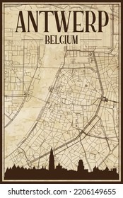 Brown vintage hand-drawn printout streets network map of the downtown ANTWERP, BELGIUM with brown city skyline and lettering