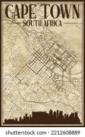 Brown vintage hand-drawn printout streets network map of the downtown CAPE TOWN, SOUTH AFRICA with brown 3D city skyline and lettering